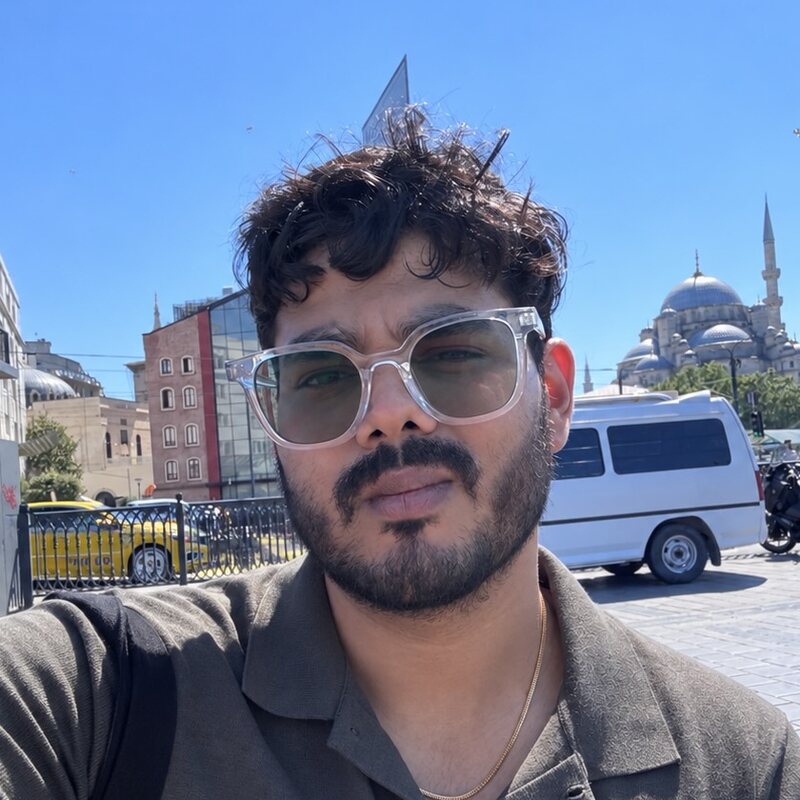 Anmol in Istanbul, with the New Mosque in the background